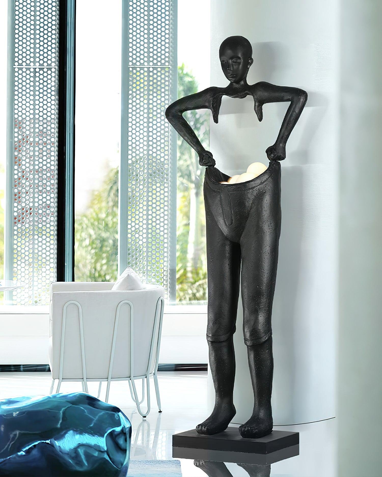 Man Carrying Pants Statue Floor Lamp