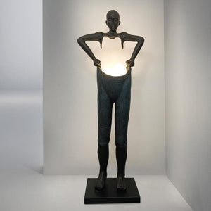 Man Carrying Pants Statue Floor Lamp