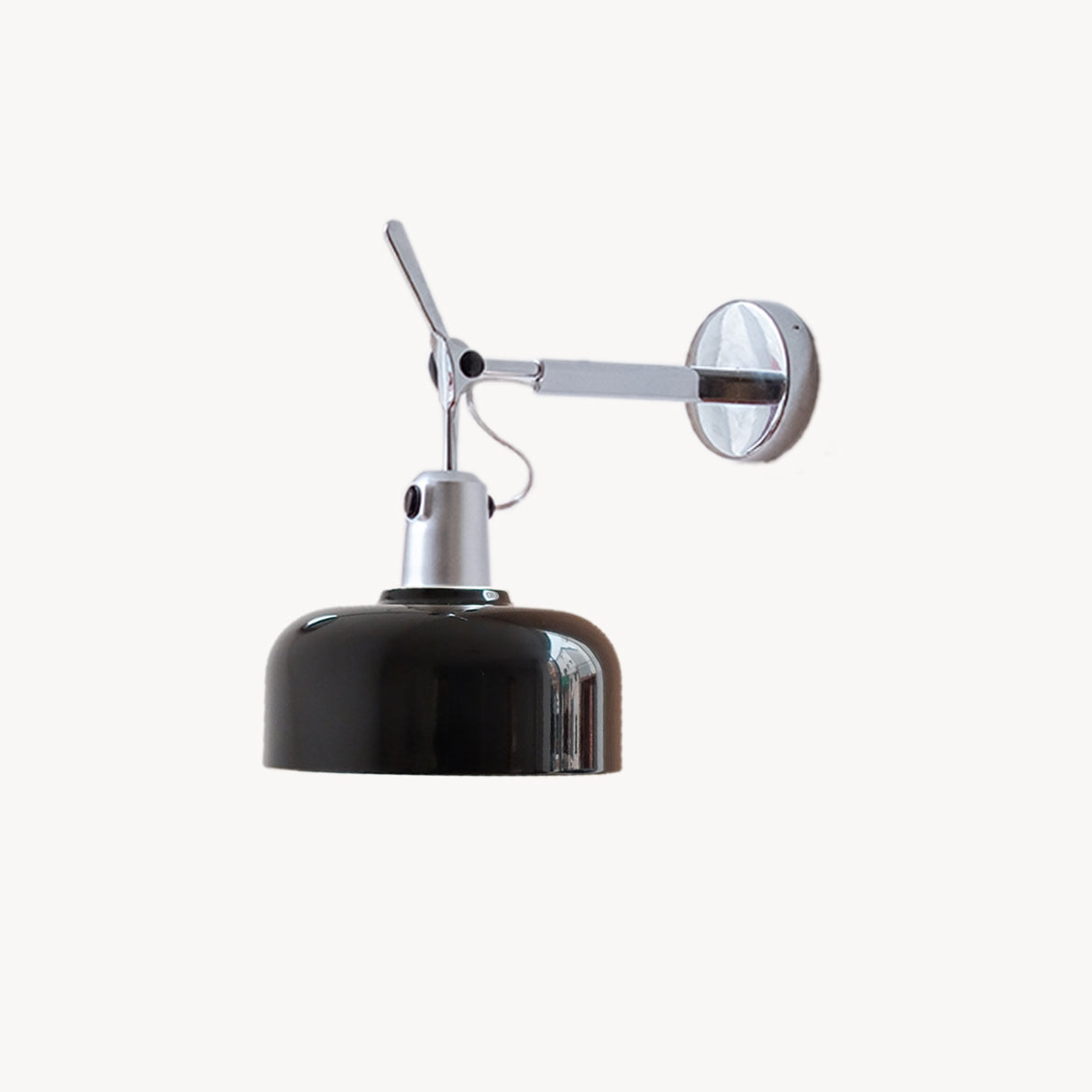 Rosso wall sconce in black for industrial office accent