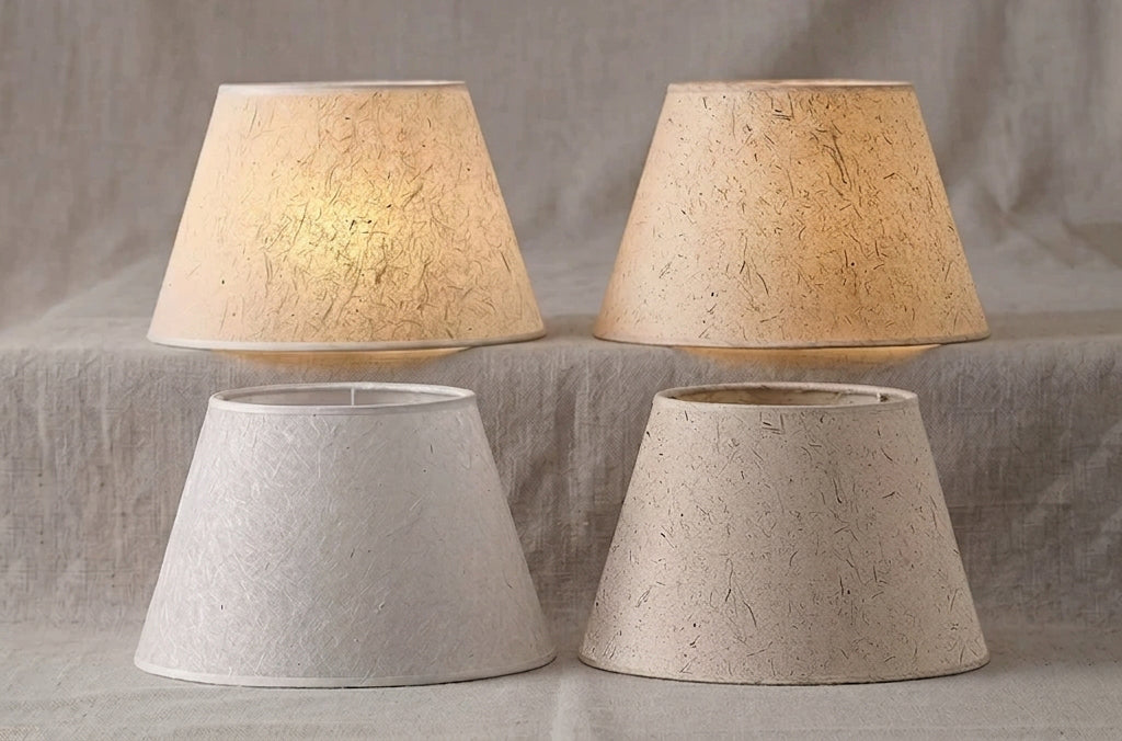Tavien Table Light shown in off-white and light brown rice paper shade colors
